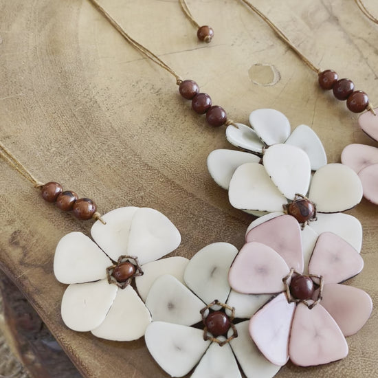 Tagua daisy flower necklace. Tagua necklace. colorful tagua necklace. handmade in ecuador tagua jewelry. Organic tagua jewelry. Acai nut beads. Helena.