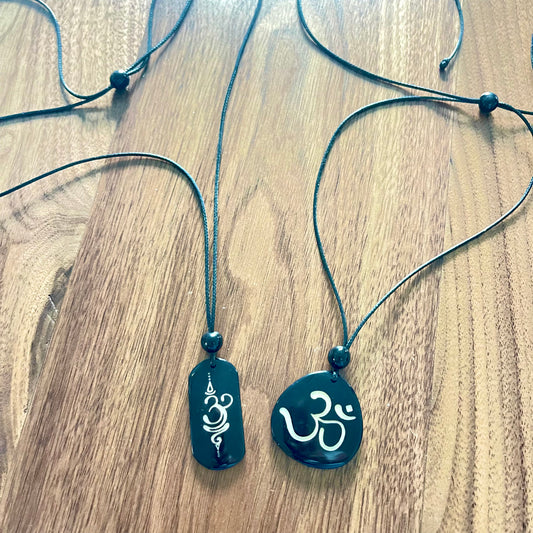 OM & BREATHE TAGUA NECKLACE