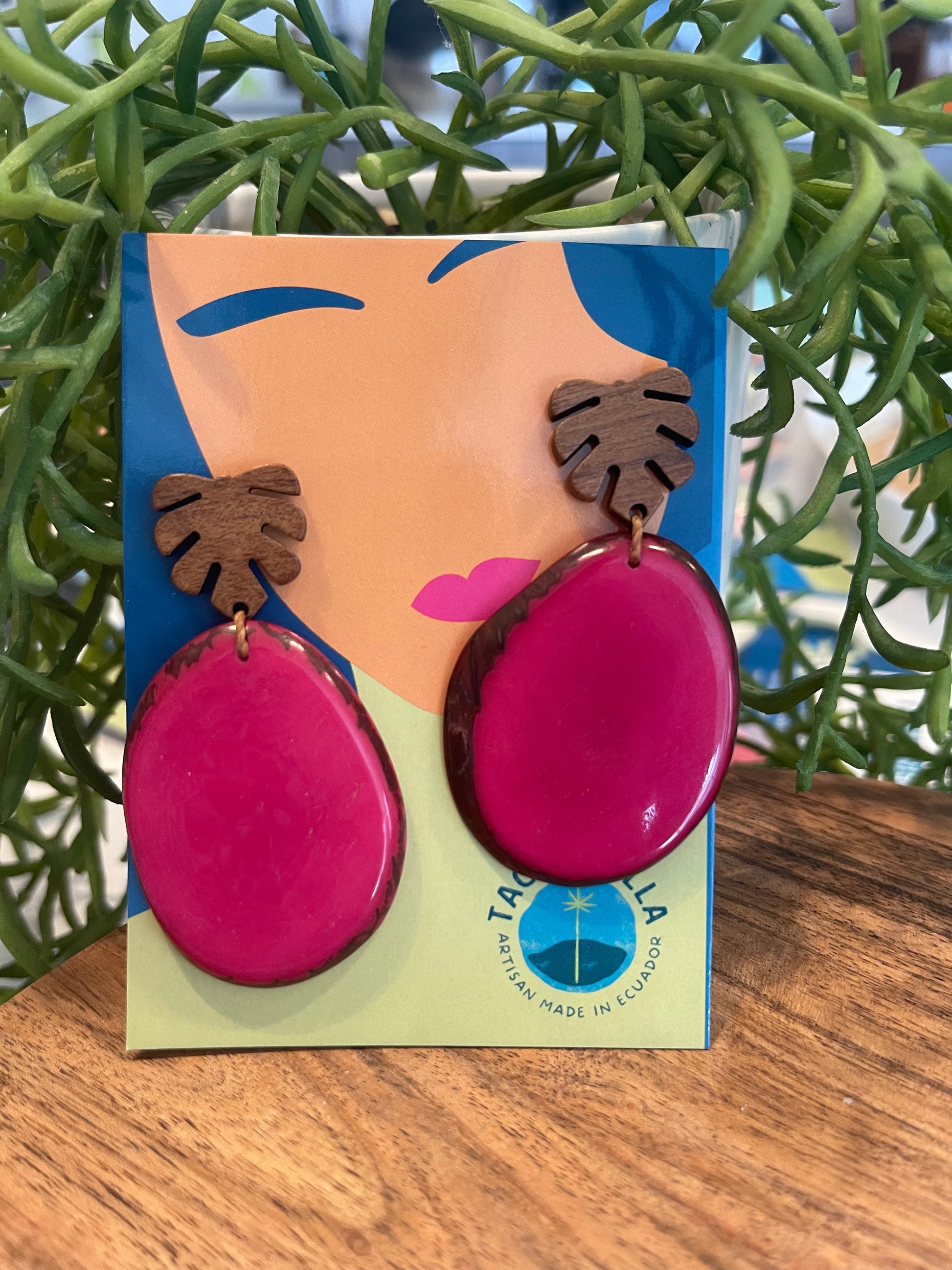 Tagua Earrings solid colorful tagua and wood monstera leaf design top with post earrings. tagua from Ecuador, made by artisans in Ecuador. Ecuador tagua jewelry. tropical earrings Tera fushia pink