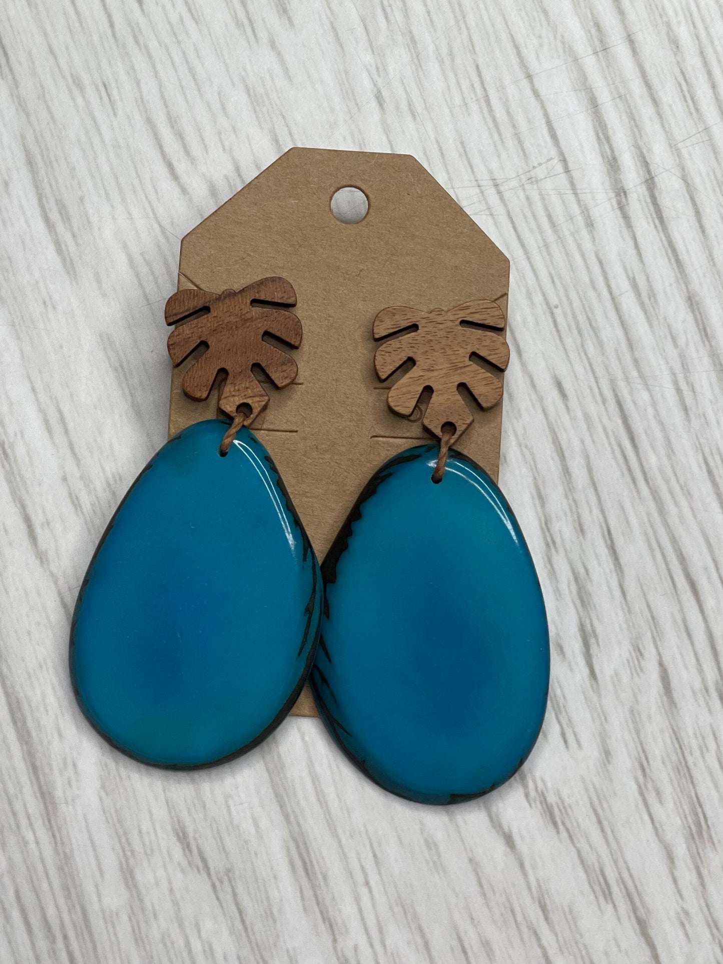 Tagua Earrings solid colorful tagua and wood monstera leaf design top with post earrings. tagua from Ecuador, made by artisans in Ecuador. Ecuador tagua jewelry. tropical earrings Tera turquoise