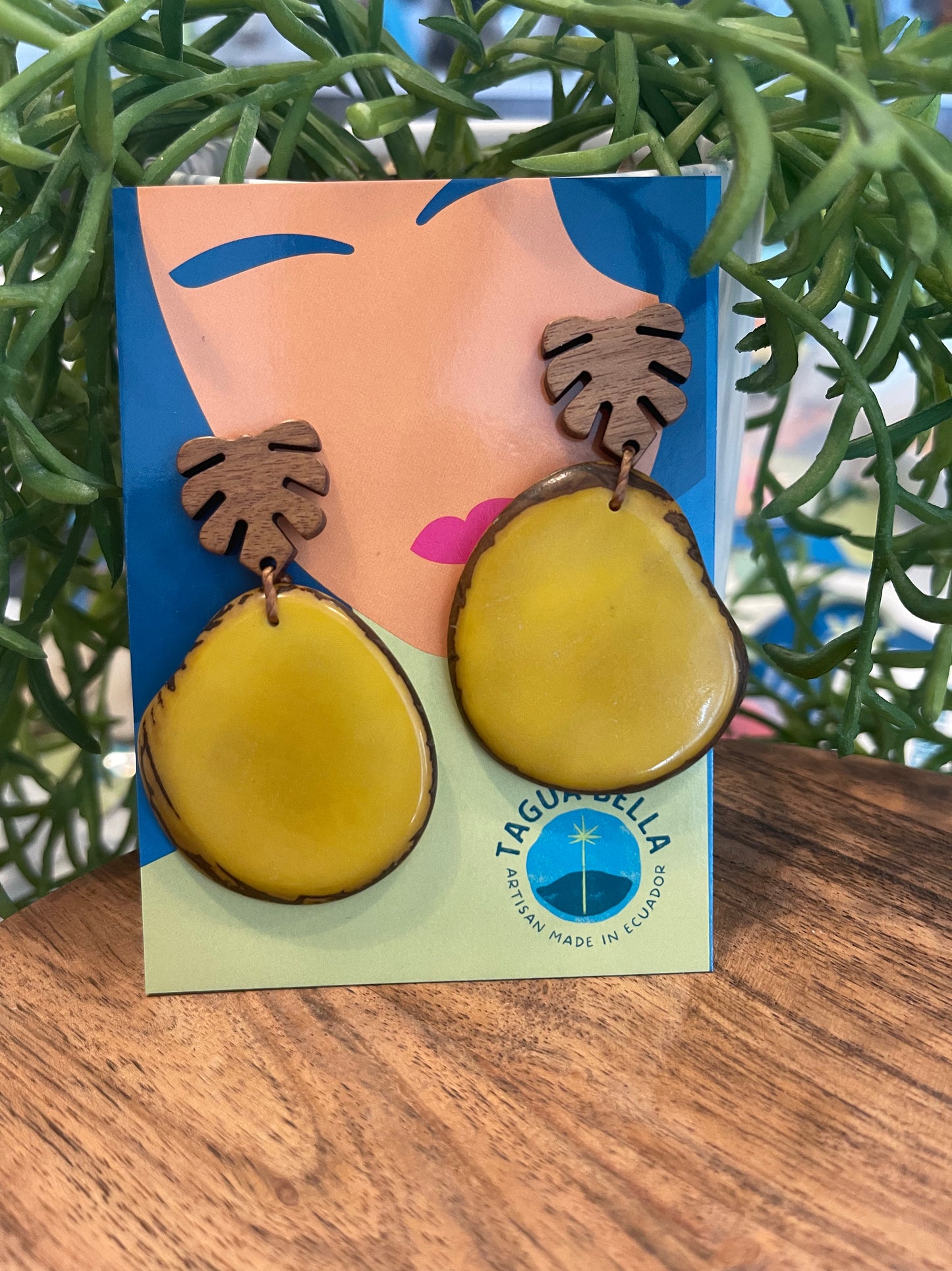 Tagua Earrings solid colorful tagua and wood monstera leaf design top with post earrings. tagua from Ecuador, made by artisans in Ecuador. Ecuador tagua jewelry. tropical earrings Tera yellow