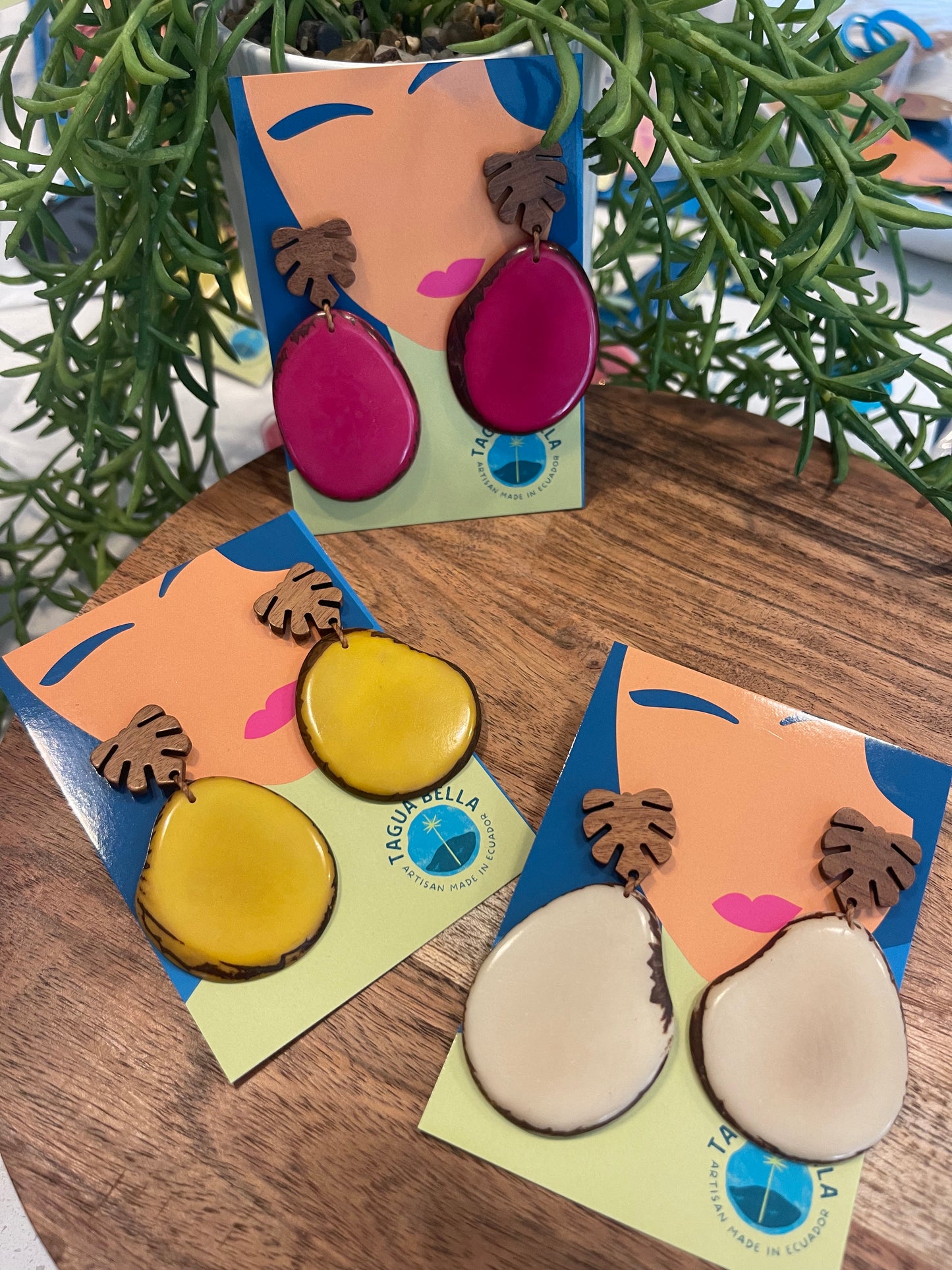 Tagua Earrings solid colorful tagua and wood monstera leaf design top with post earrings. tagua from Ecuador, made by artisans in Ecuador. Ecuador tagua jewelry. tropical earrings Tera